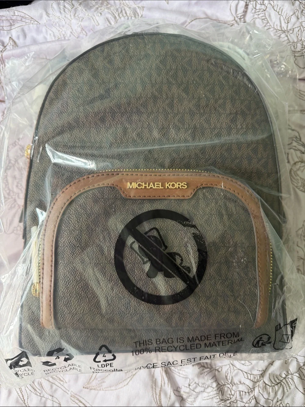 Michael Kors Brown Monogram Backpack with Tan Trim and Gold Hardware